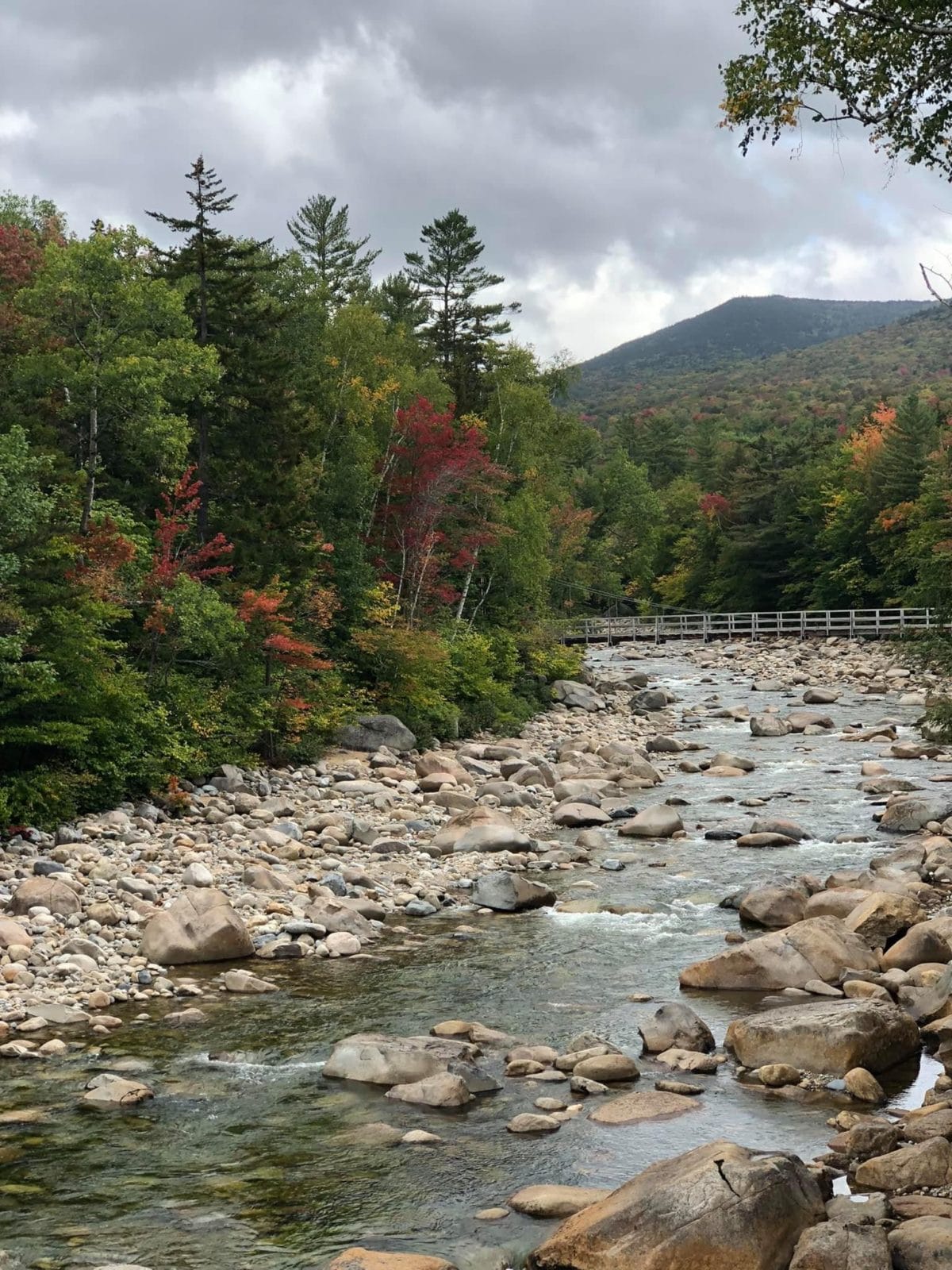 flowing brook of water over rocks along the Kancamagus Highway