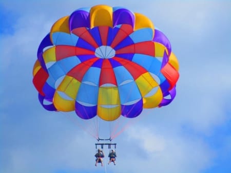 parasailing above the water in Port Aransas, Texas