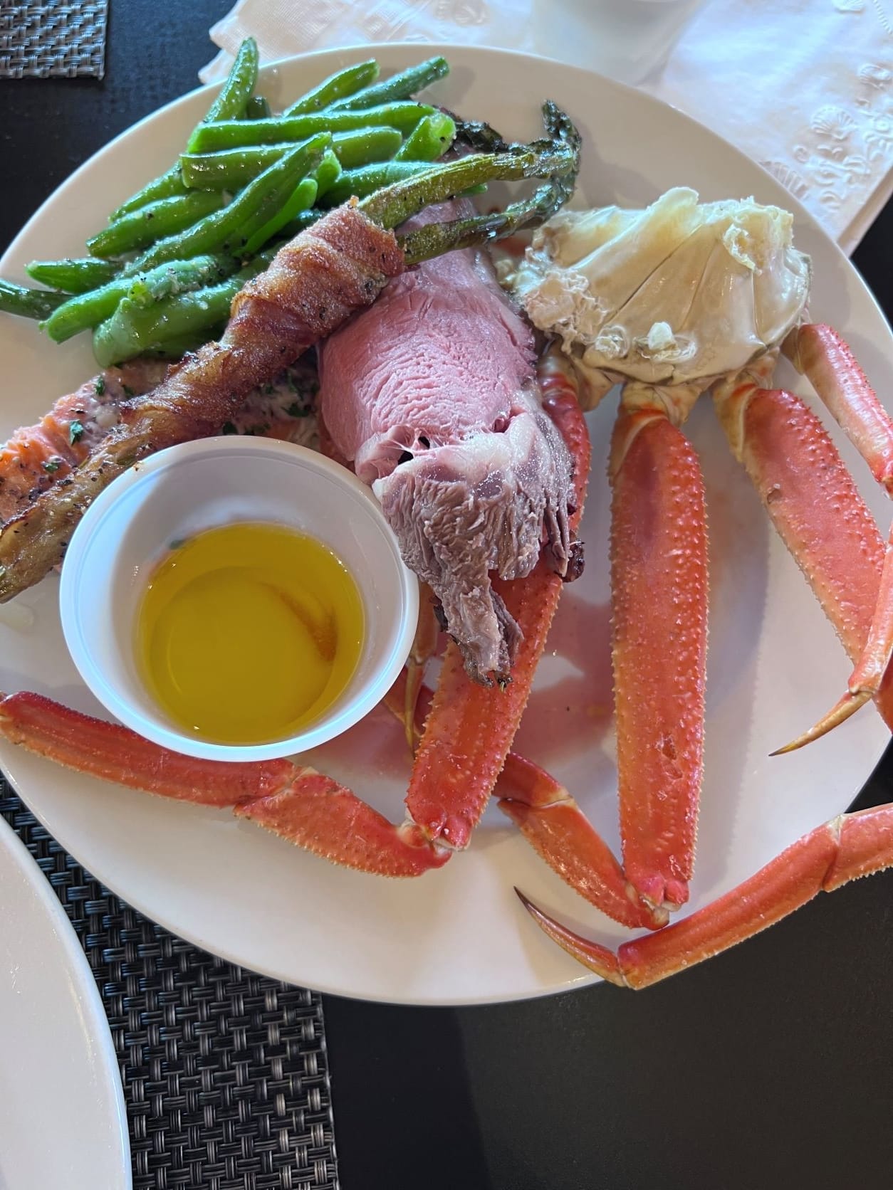 plate with crab legs and vegetables