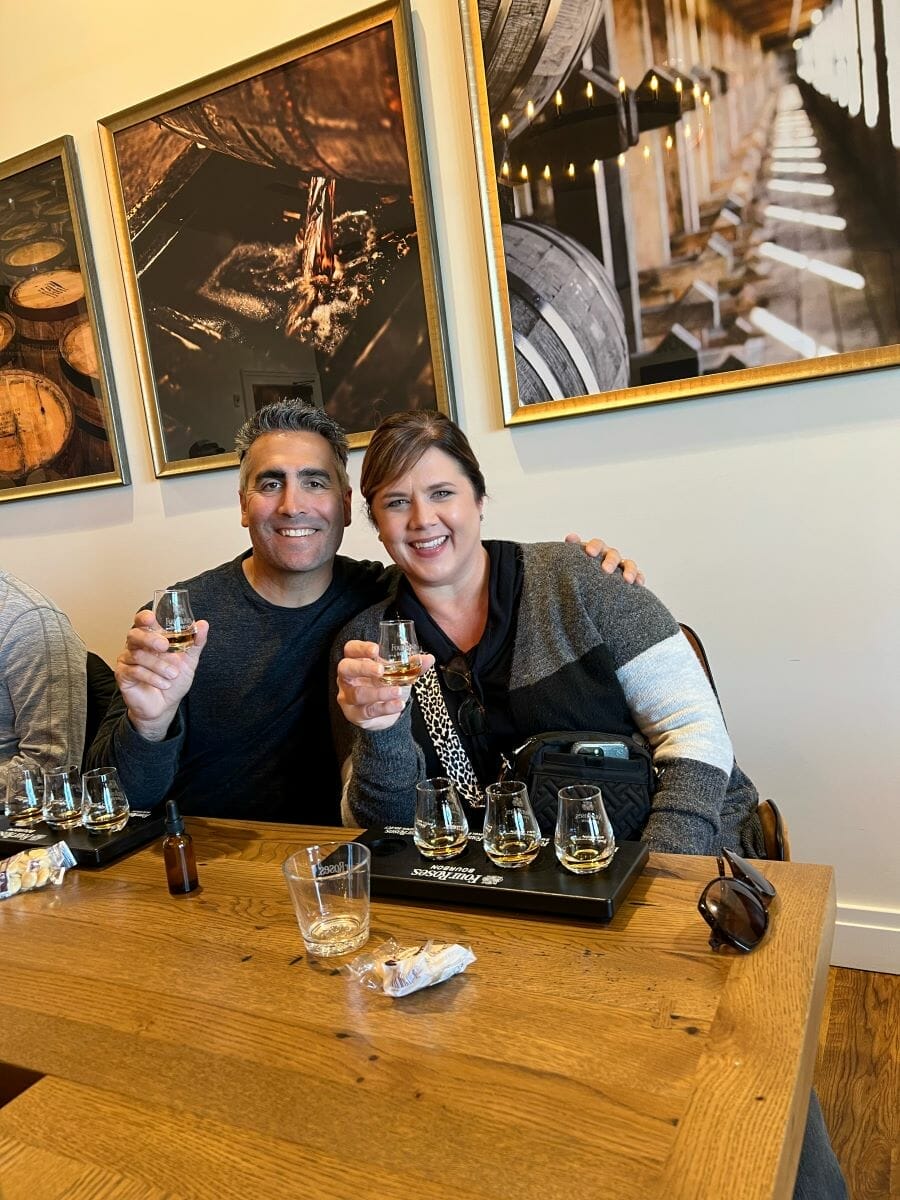 man and woman in bourbon tasting room