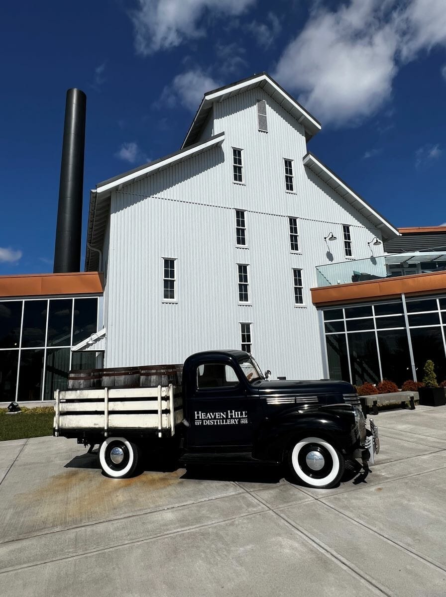 truck parked outside Heaven Hill distillery white building