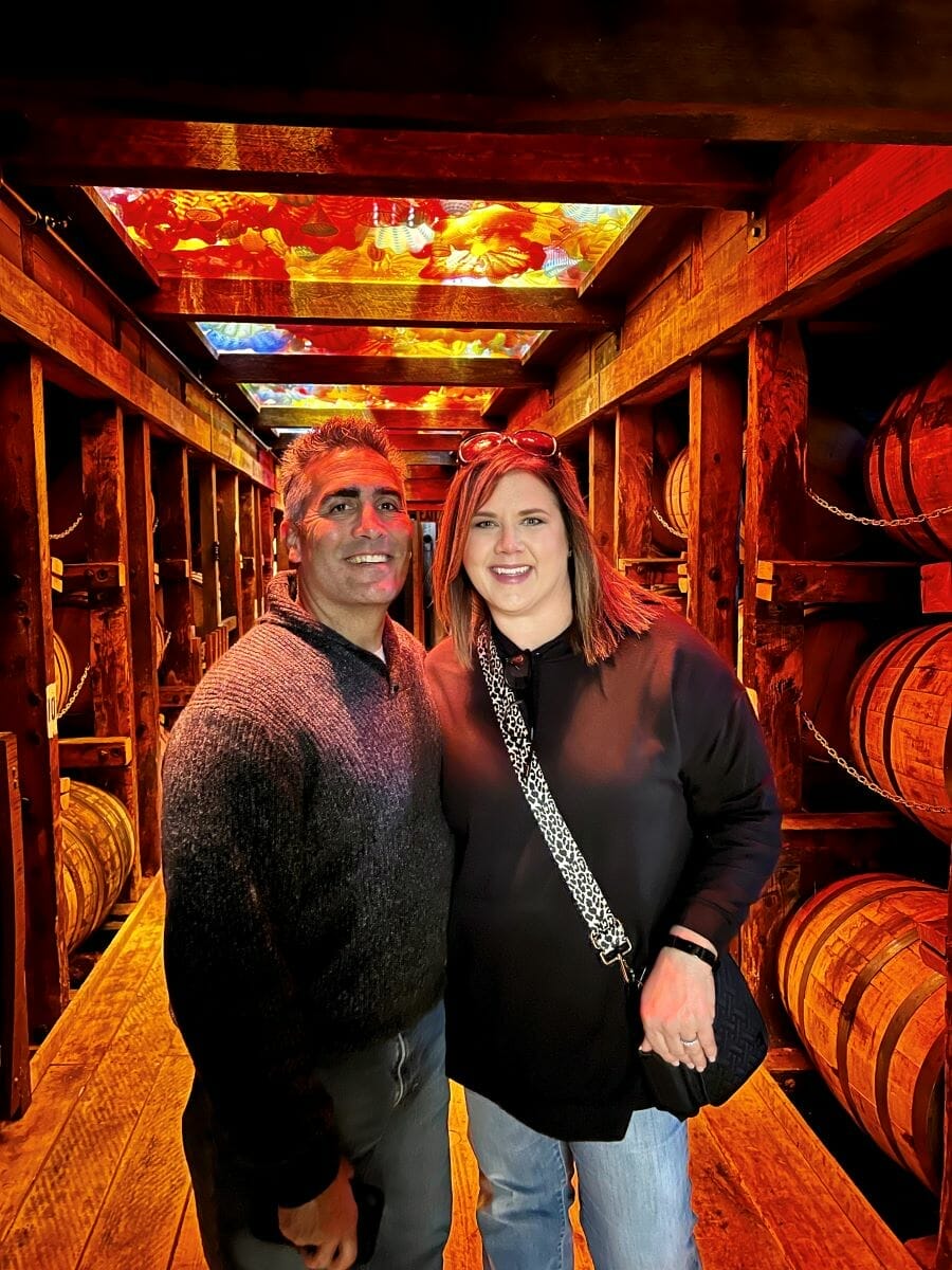 man and woman standing in Makers Mark cellar