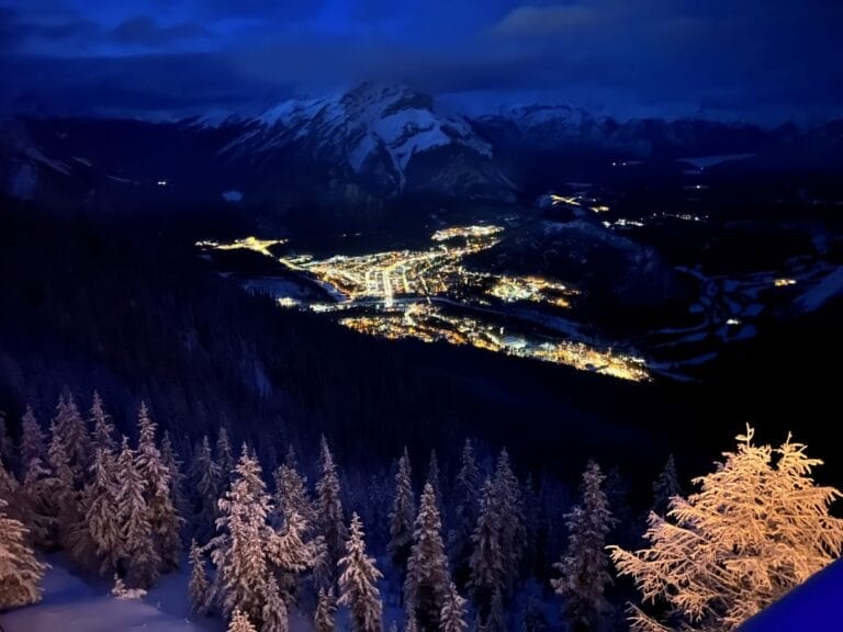 Nighttime view of Banff town from top of gondola