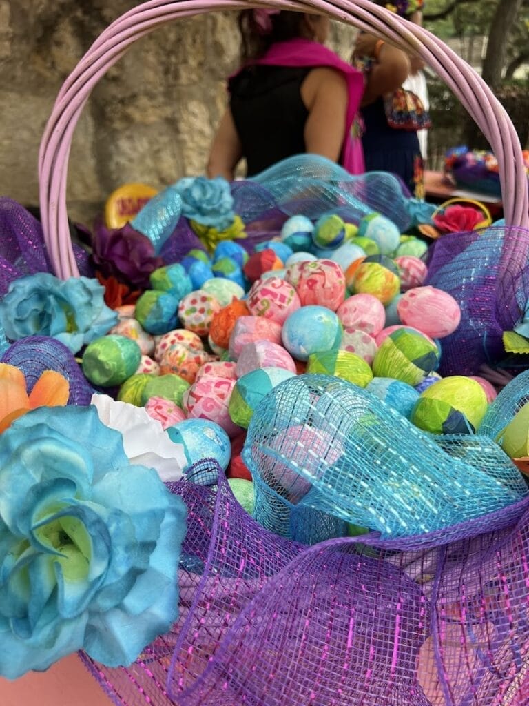 cascarones basket filled with colorful confetti eggs