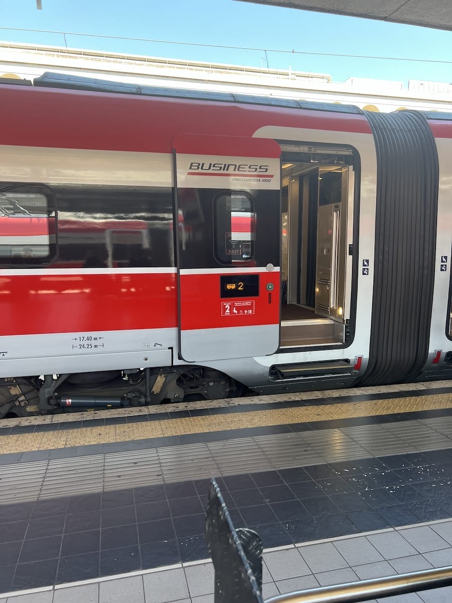 open train door with car number displayed