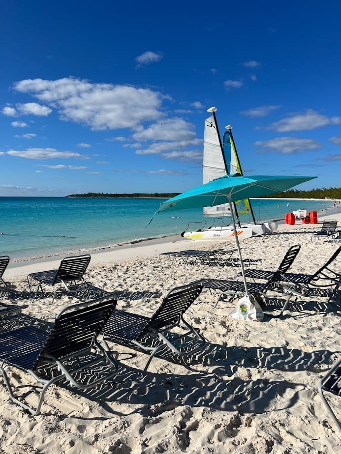 beach chair with umbrellas