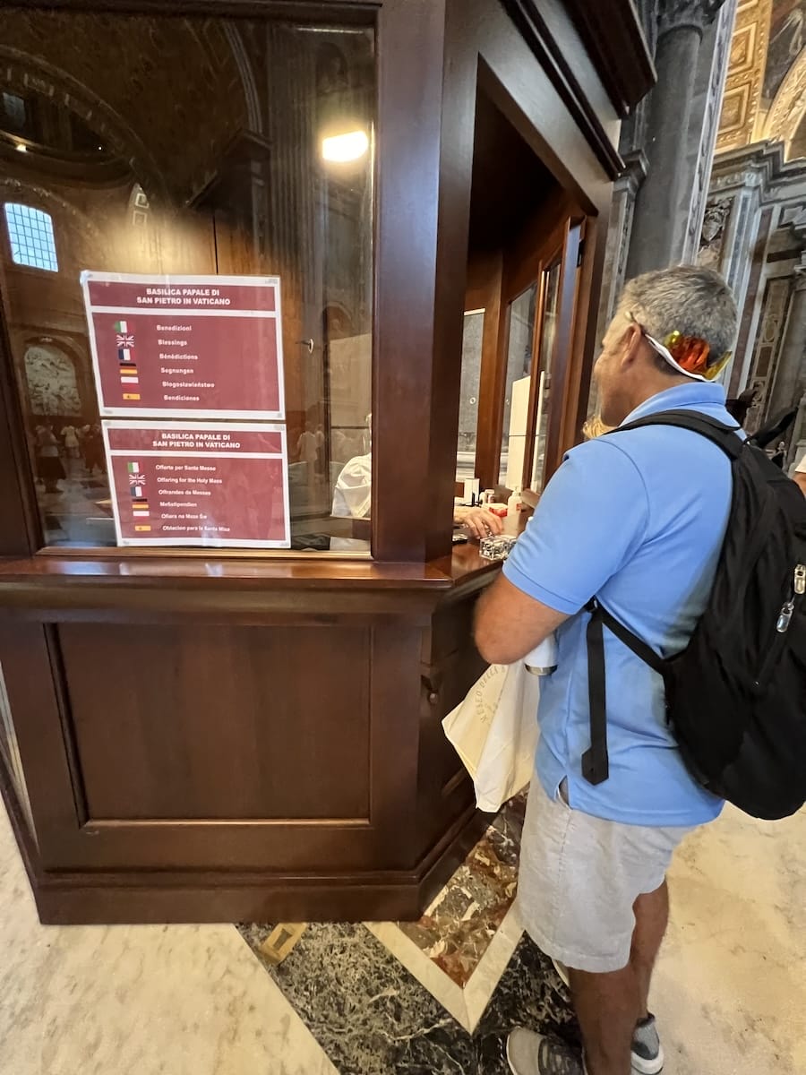 being blessed by bishop