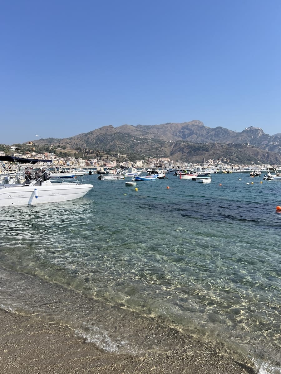 Giardini Naxos beach water