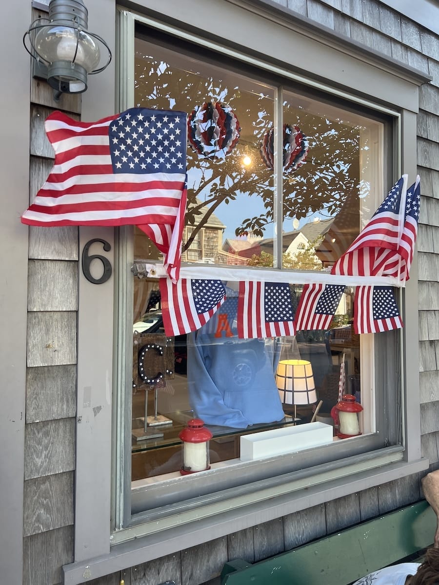 Nantucket storefront with flag