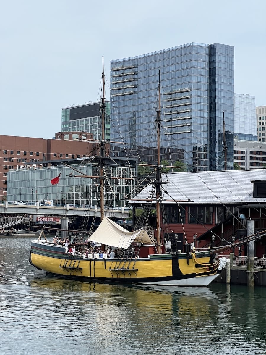 yellow ship in Boston Harbor