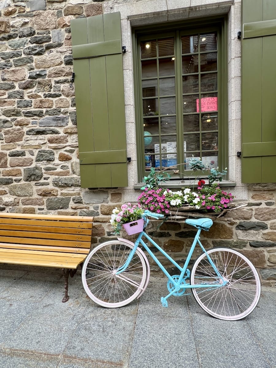 bike in front of window in Quebec City