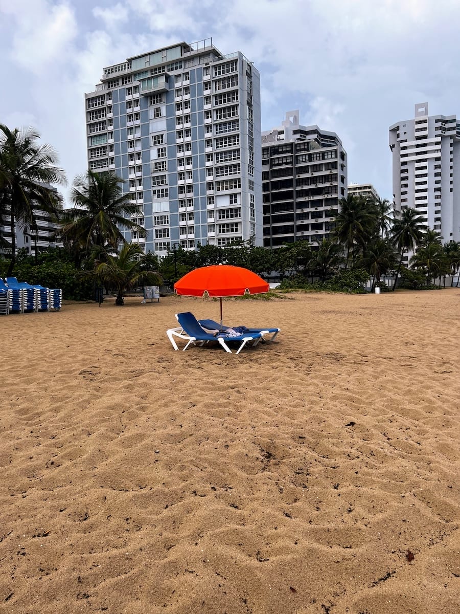 beach chair and umbrellas