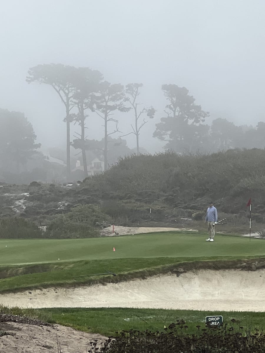 golfer in fog on 17 mile drive