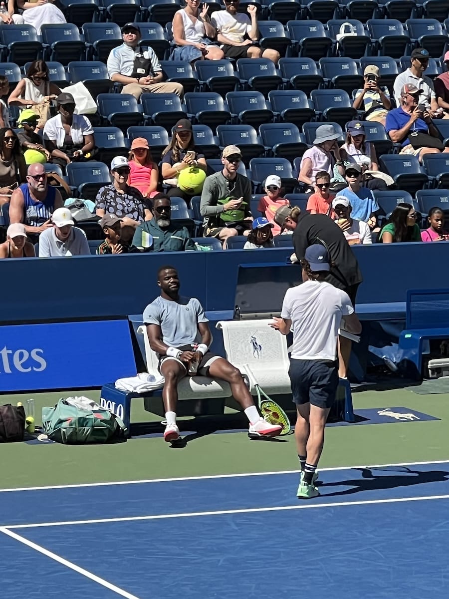 players on the practice courts